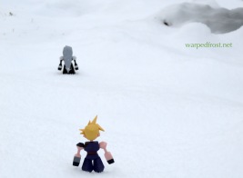 In a field of snow, Polygon Figure Cloud watches Polygon Sephiroth in the distance. Both figures are seen from the back.